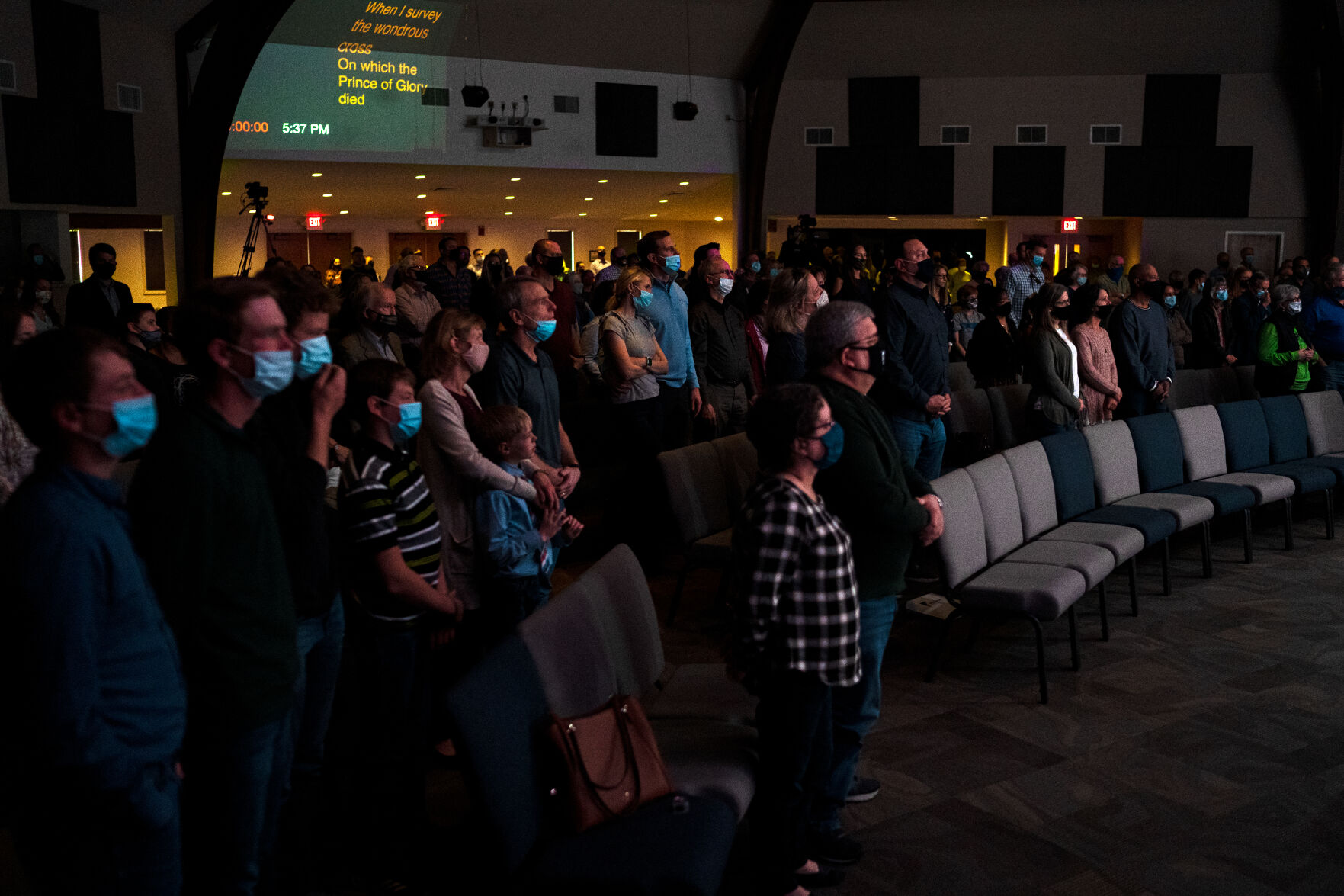 Parishioners of Forum Christian Church stand